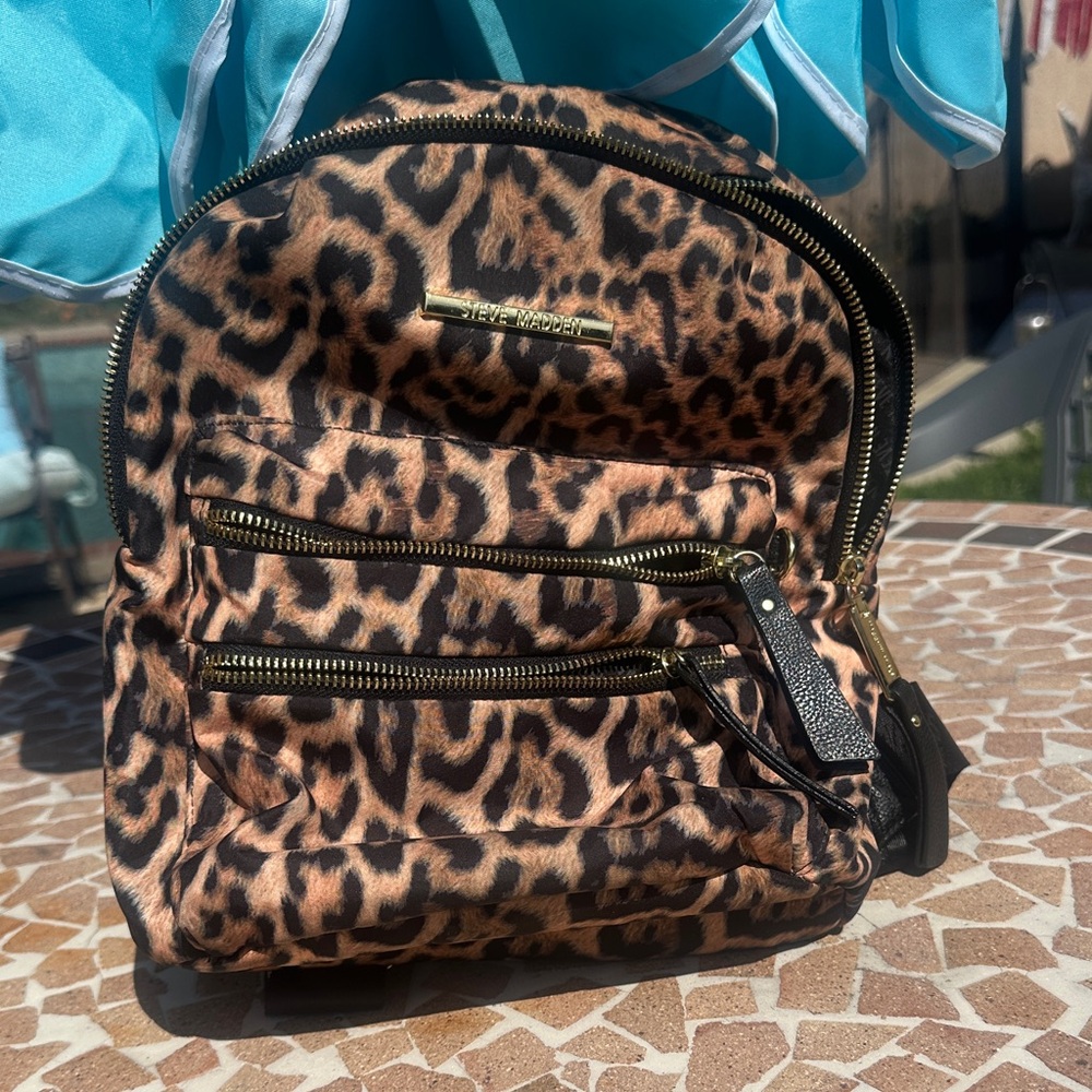 Steve Madden Animal Print Backpack with Gold Accents
